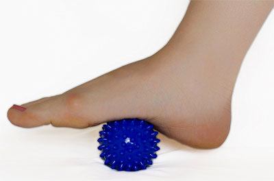 Blue Foot Massage Ball Rolling Under Foot